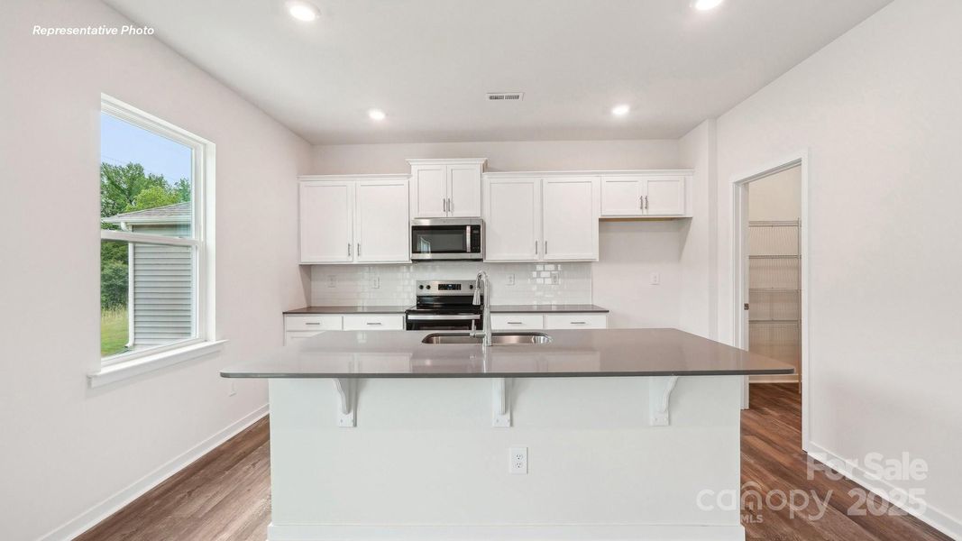 Furnished interior view inside a new home in Reedy Creek Preserve, Charlotte (Image 8).