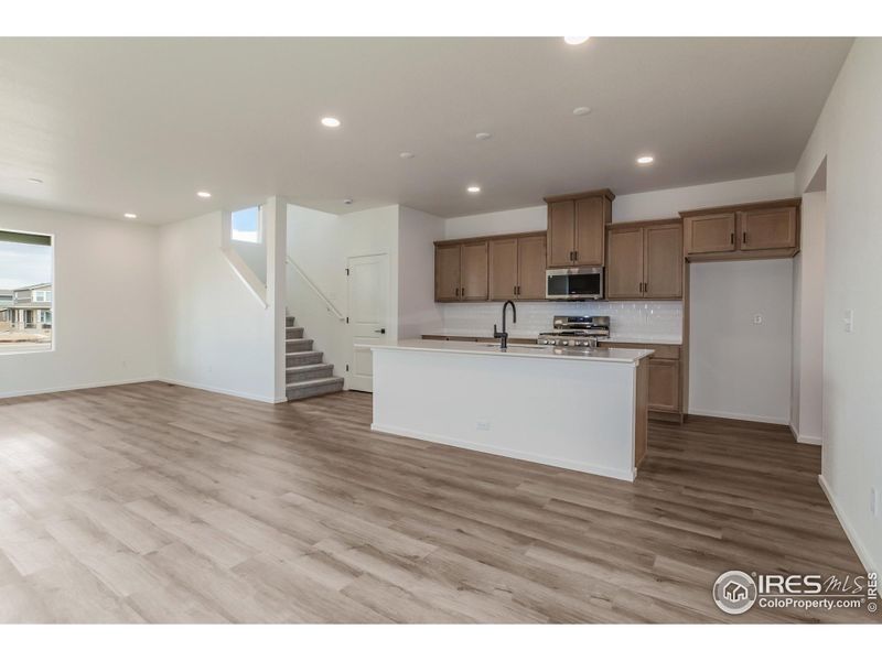KITCHEN OPEN TO DINING AND LIVING ROOM KITCHEN OPEN TO DINING AND LIVING ROOM