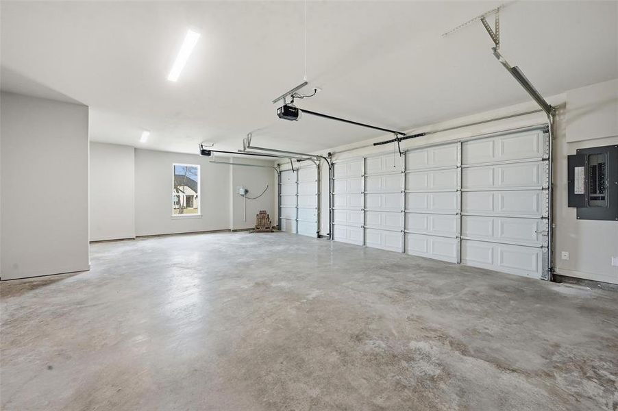 Garage featuring electric panel