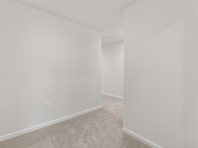 Spacious, unfurnished interior of a new home in Waypoint, Flowery Branch (Image 26).