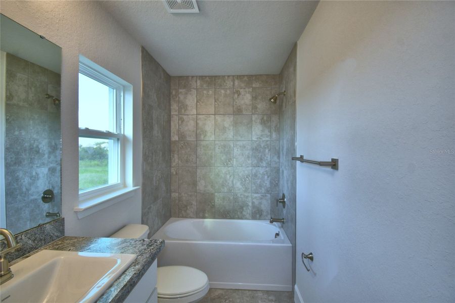 Furnished interior view inside a new home in Cadence Crossing, Auburndale (Image 13).