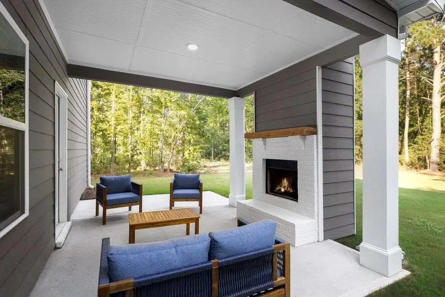 Exterior details and patio area of a home in The Woodlands Preserve, Jackson (Image 2).