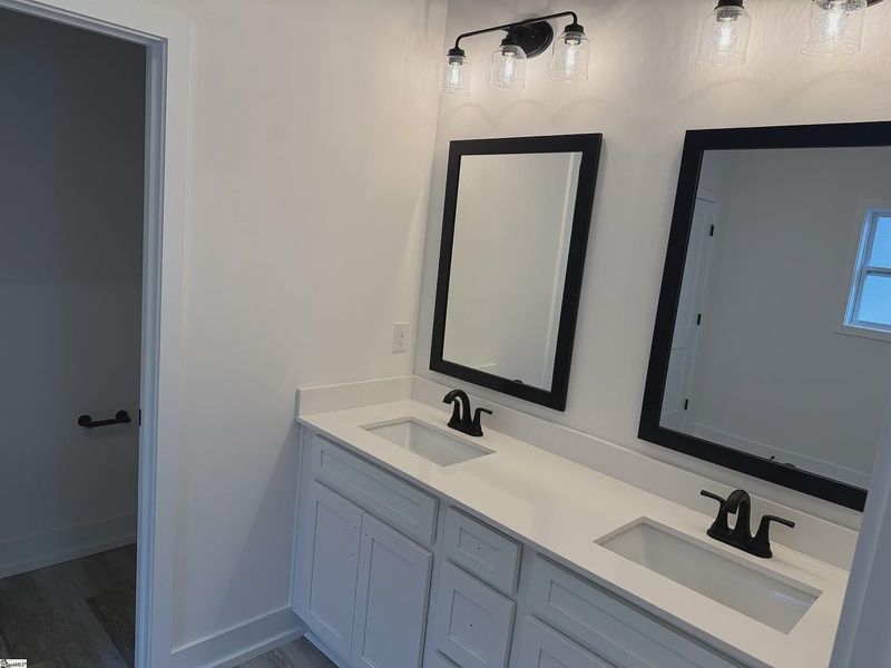 Furnished interior view inside a new home in Hidden Lake Estates, Greenville (Image 5).