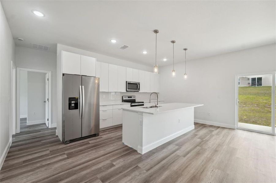 Furnished interior view inside a new home in , Ocala (Image 6).