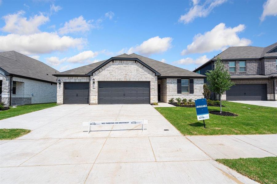 Front exterior of a new home in Lakehaven - Premier Series, Farmersville, TX, highlighting curb appeal (Image 2). Front exterior of a new home in Lakehaven - Premier Series, Farmersville, TX, highlighting curb appeal (Image 2).