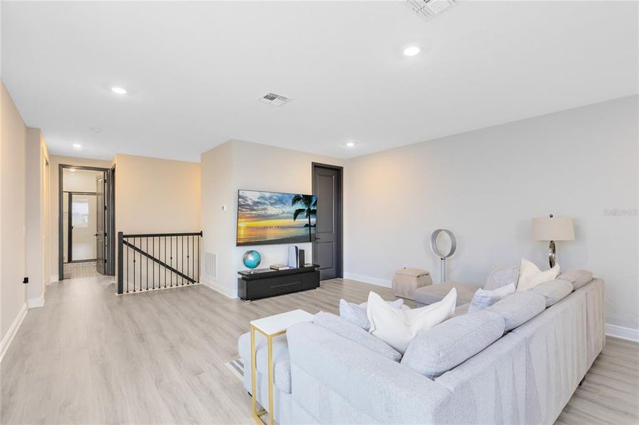 Furnished interior view inside a new home in Laureate Park, Orlando (Image 28).
