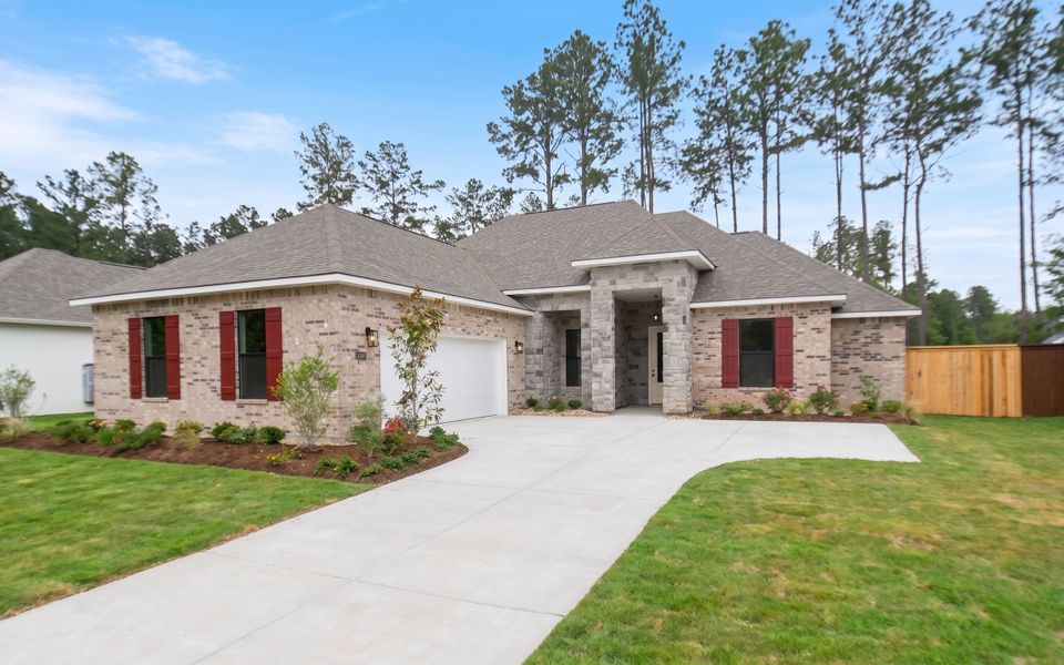 Front exterior of a new home in Longleaf, Lumberton, TX, highlighting curb appeal (Image 1). Front exterior of a new home in Longleaf, Lumberton, TX, highlighting curb appeal (Image 1).