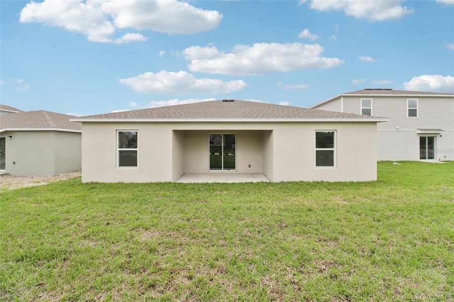 Exterior details and patio area of a home in Sumter Villas, Sumterville (Image 25).