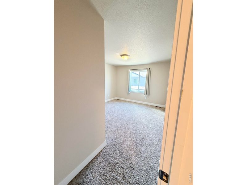 Spacious, unfurnished interior of a new home in Northridge Trails Townhomes, Greeley (Image 15).