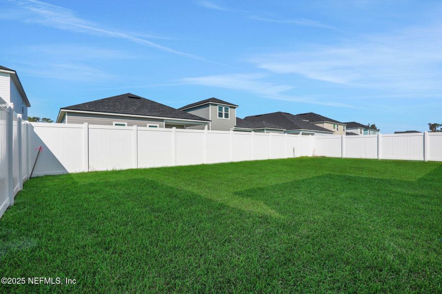 Exterior details and patio area of a home in Jennings Farm, Middleburg (Image 25).