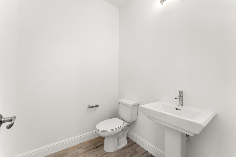 Furnished interior view inside a new home in Newfield - Rosette Park, Palm City (Image 4).