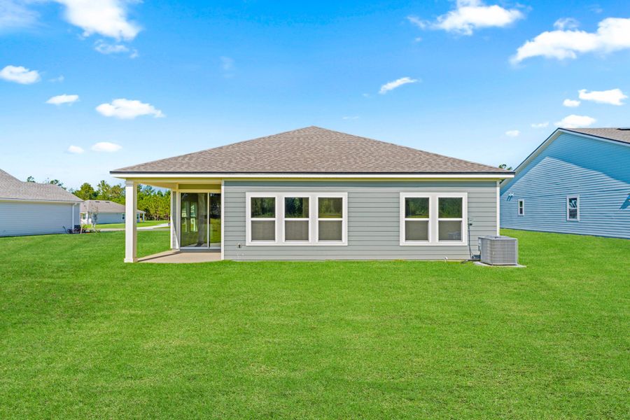 Lot 591 Rear Exterior with Covered Patio at NorthShore in Kingsland