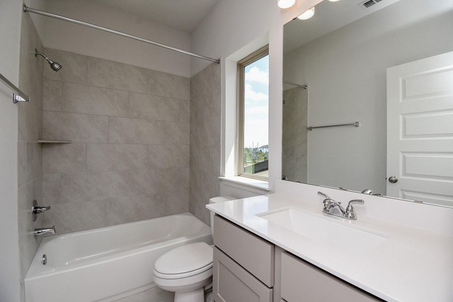 Furnished interior view inside a new home in Marvida, Cypress (Image 17).