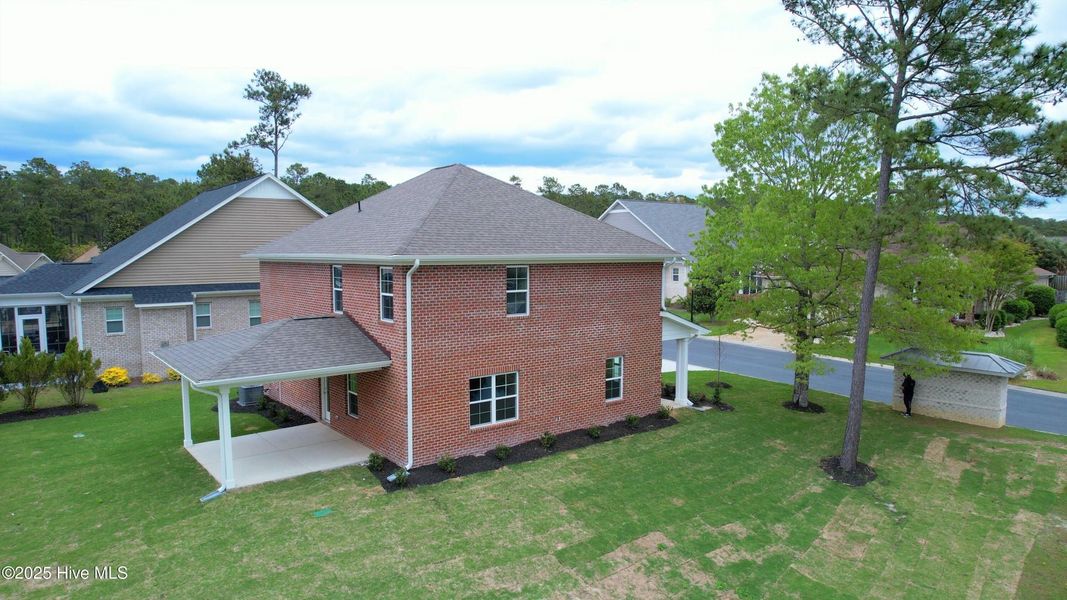 Front exterior of a new home in Palmetto Creek, Bolivia, NC, highlighting curb appeal (Image 18).