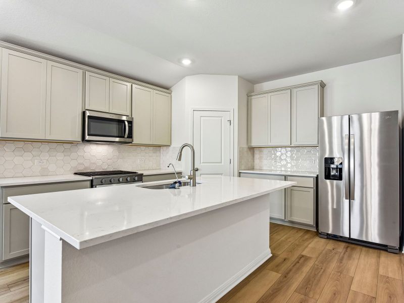 Furnished interior view inside a new home in Colony at Cole Springs - Boulevard Collection, Buda (Image 3).