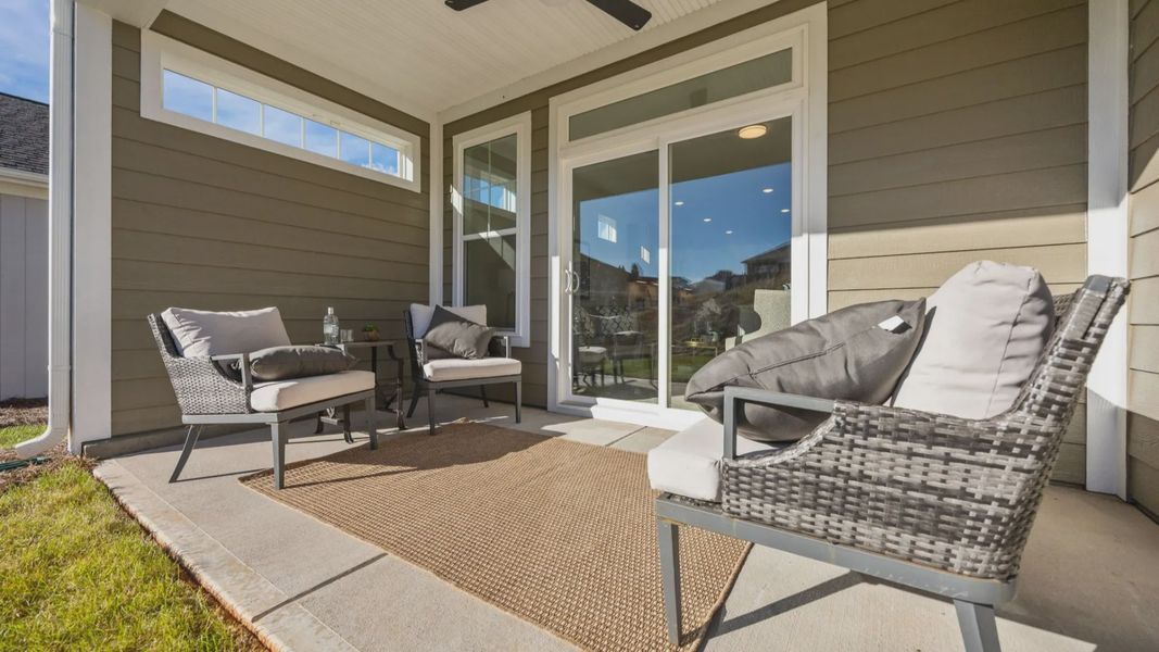Exterior details and patio area of a home in Village at Maple Leaf Farm, King (Image 3).