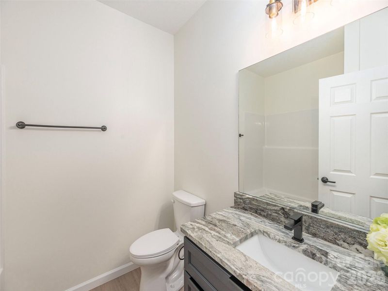Furnished interior view inside a new home in , Waynesville (Image 10).