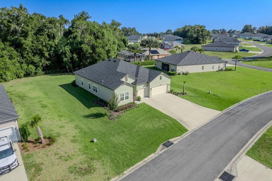 Front exterior of a new home in Grand Park North, Dunnellon, FL, highlighting curb appeal (Image 26).