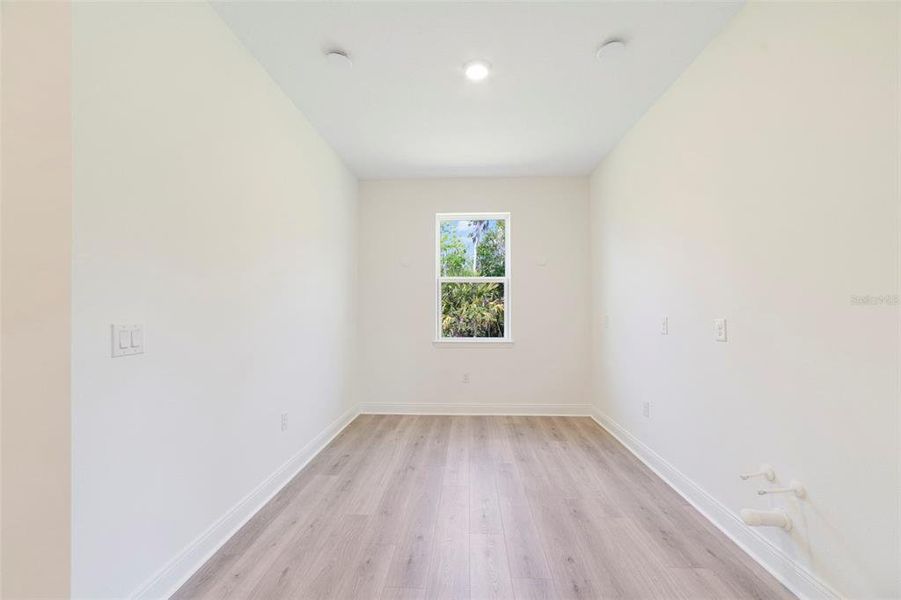 Spacious, unfurnished interior of a new home in Estates at Lake Jesup, Sanford (Image 21).