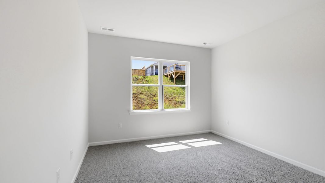 Spacious, unfurnished interior of a new home in Valleywood Farms, Waynesville (Image 25).