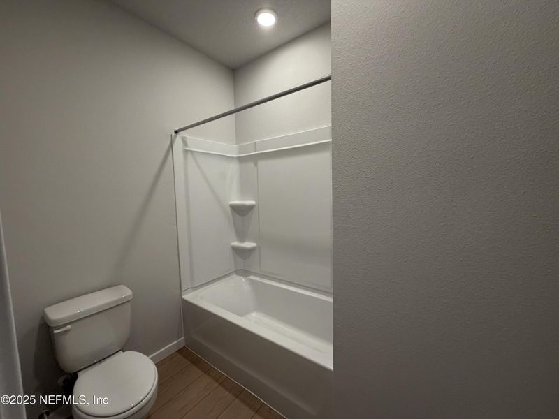 Furnished interior view inside a new home in The Magnolia Series at Reserve East, Flagler Beach (Image 11).