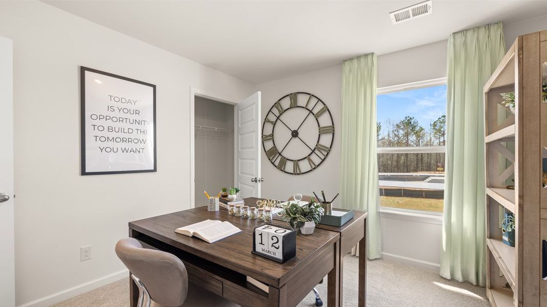 Representative furnished interior of a home built from the HAYDEN Express by D.R. Horton in WillowBrook, Winder (Image 62).