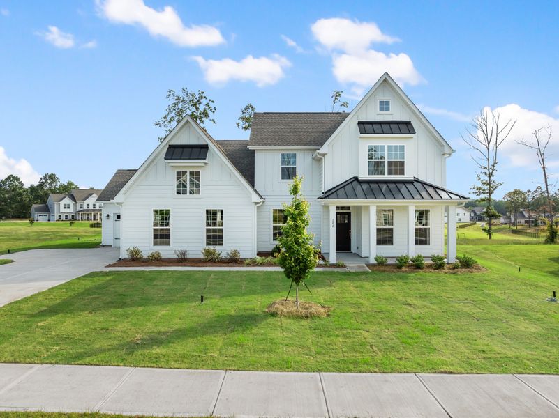 Front exterior of a home in the Highland Colony Estates community, located in Greer, SC (Image 2). Front exterior of a home in the Highland Colony Estates community, located in Greer, SC (Image 2).