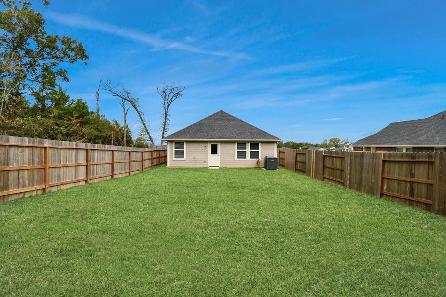 Exterior details and patio area of a home in Montgomery Ridge: Founders Collection, Montgomery (Image 2).