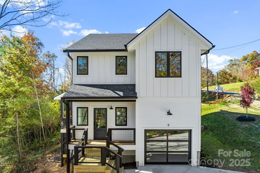 Front exterior of a new home in , Weaverville, NC, highlighting curb appeal (Image 1).