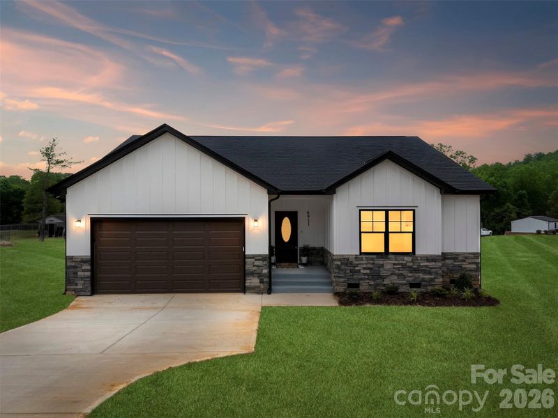 Front exterior of a new home in , Connelly Springs, NC, highlighting curb appeal (Image 24).