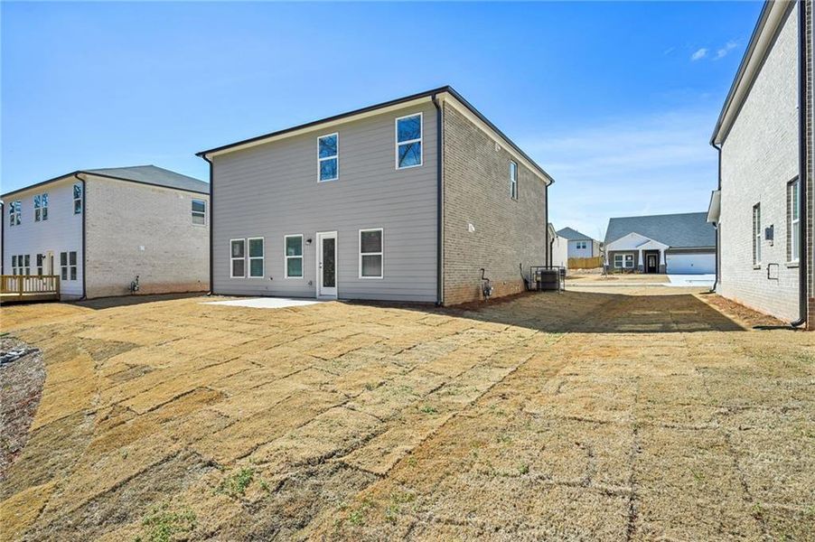 Exterior details and patio area of a home in Creekside at Oxford Park, Fairburn (Image 4).