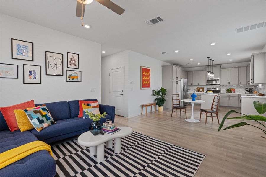Living room featuring  recessed lighting and ceiling fan