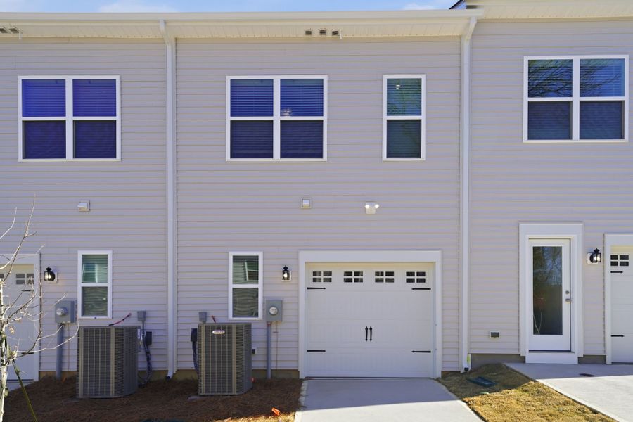 Exterior details and patio area of a home in Lakeview Village, Charlotte (Image 2). Exterior details and patio area of a home in Lakeview Village, Charlotte (Image 2).