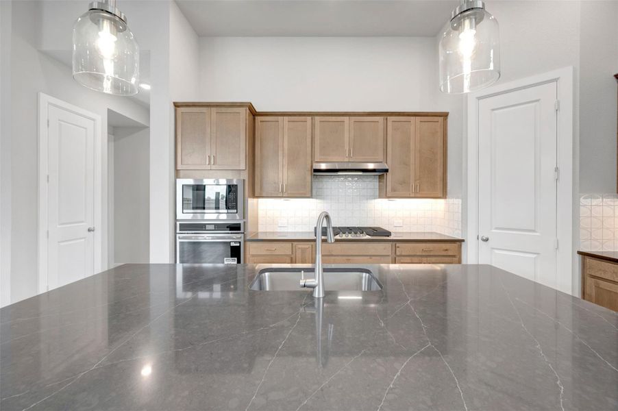Furnished interior view inside a new home in Sienna - Landmark Row Collection, Missouri City (Image 6).