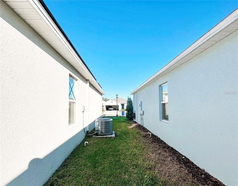 Exterior details and patio area of a home in Harmony at Lake Eloise, Winter Haven (Image 3). Exterior details and patio area of a home in Harmony at Lake Eloise, Winter Haven (Image 3).