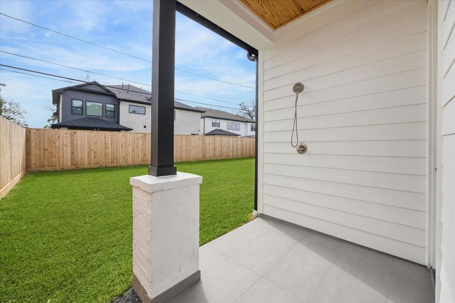 Outdoor shower. Ideal for a future pool.