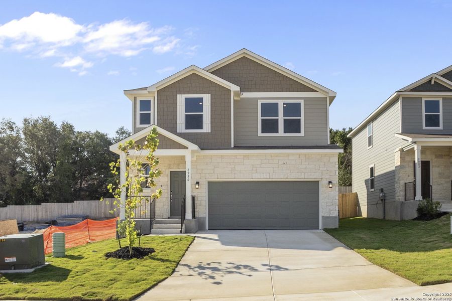 Front exterior of a new home in Rosemont Hill, San Antonio, TX, highlighting curb appeal (Image 1). Front exterior of a new home in Rosemont Hill, San Antonio, TX, highlighting curb appeal (Image 1).