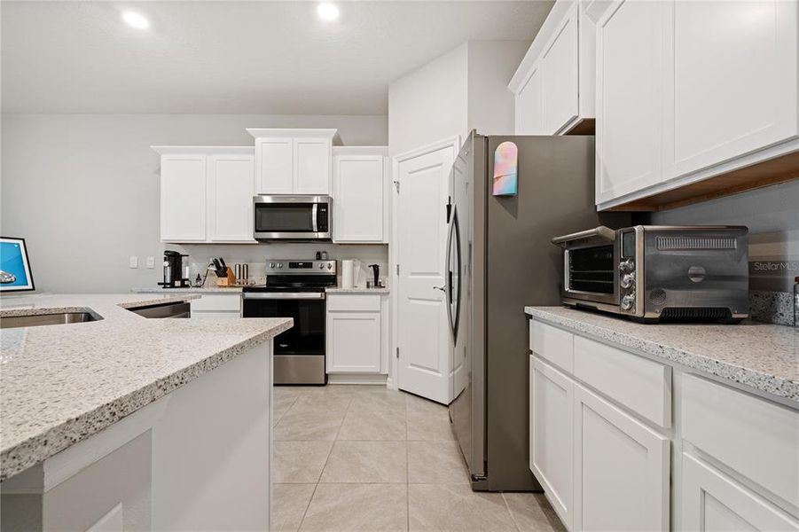 Furnished interior view inside a new home in Towns at Woodsdale Villas, Wesley Chapel (Image 4).