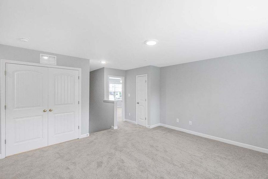 Representative unfurnished interior of a home built from the Drayton by Caviness & Cates Communities in Bartlett Manor, Youngsville (Image 86).