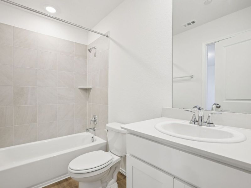 Furnished interior view inside a new home in Turner's Village, Buda (Image 6).