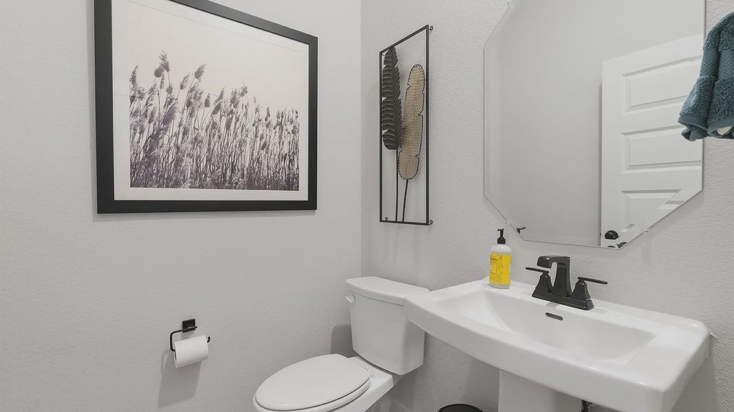 Representative furnished interior of a home built from the Wilson by Chesmar Homes in Lariat, Liberty Hill (Image 5).