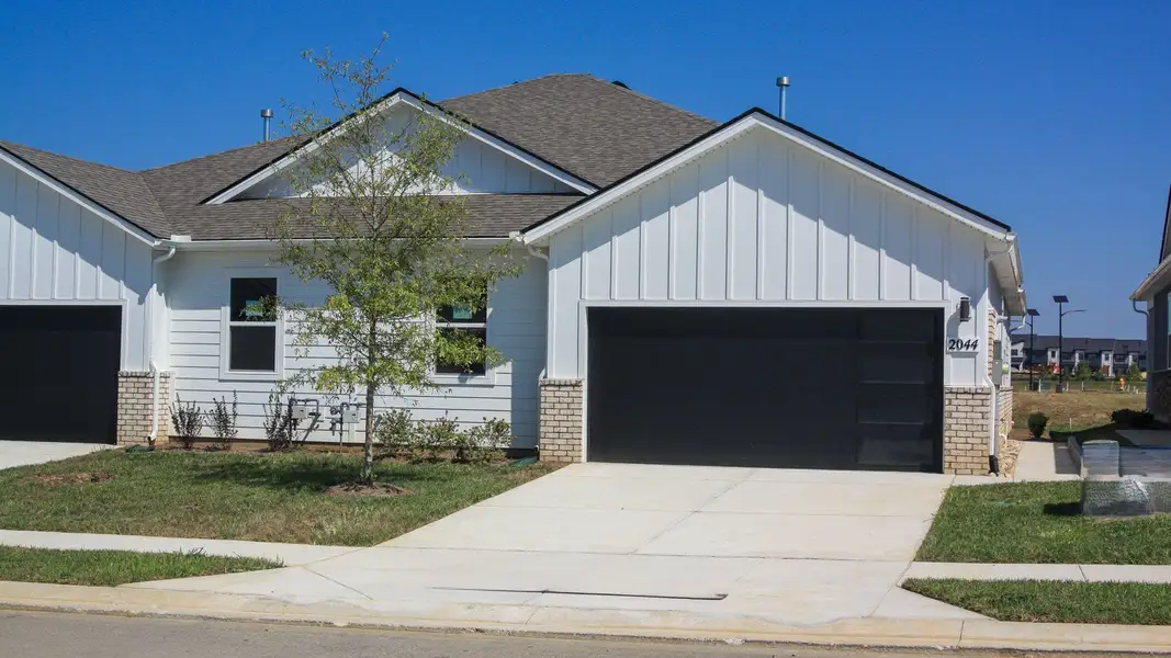 Front exterior of a new home in Nexus South, Gallatin, TN, highlighting curb appeal (Image 22).
