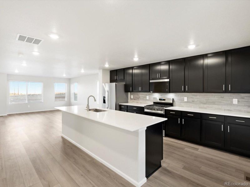 Furnished interior view inside a new home in Three Hills, Morrison (Image 8).