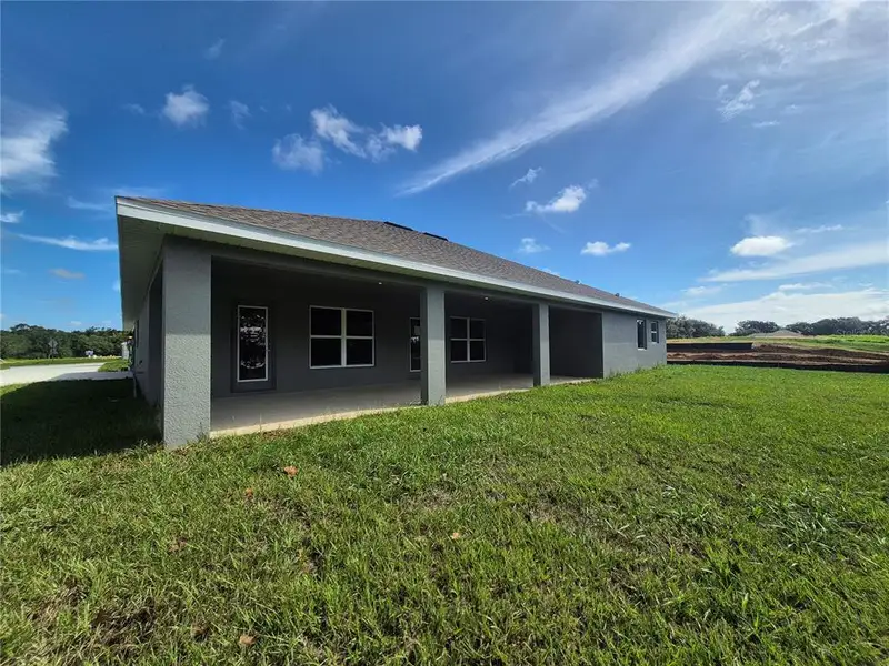 Exterior details and patio area of a home in Hill Country Estates, Dade City (Image 2). Exterior details and patio area of a home in Hill Country Estates, Dade City (Image 2).