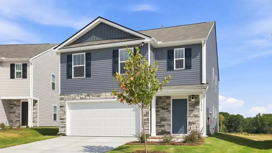 Front exterior of a new home in Seneca Falls, Seneca, SC, highlighting curb appeal (Image 2). Front exterior of a new home in Seneca Falls, Seneca, SC, highlighting curb appeal (Image 2).