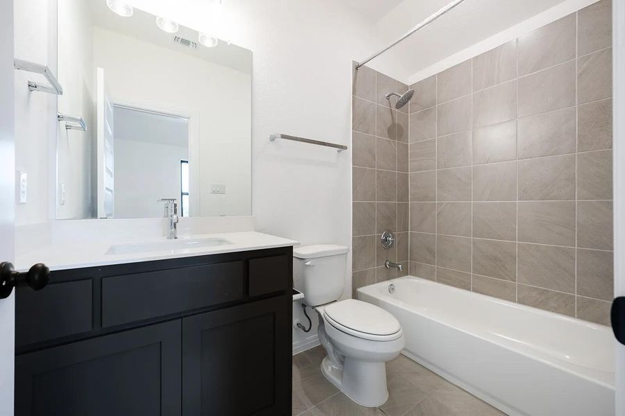 Furnished interior view inside a new home in Caliterra - 80', Dripping Springs (Image 3).