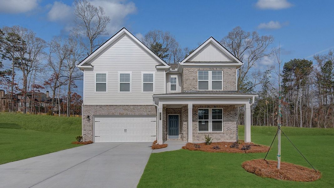 Front exterior of a new home in Hamilton Lakes, Lawrenceville, GA, highlighting curb appeal (Image 21).