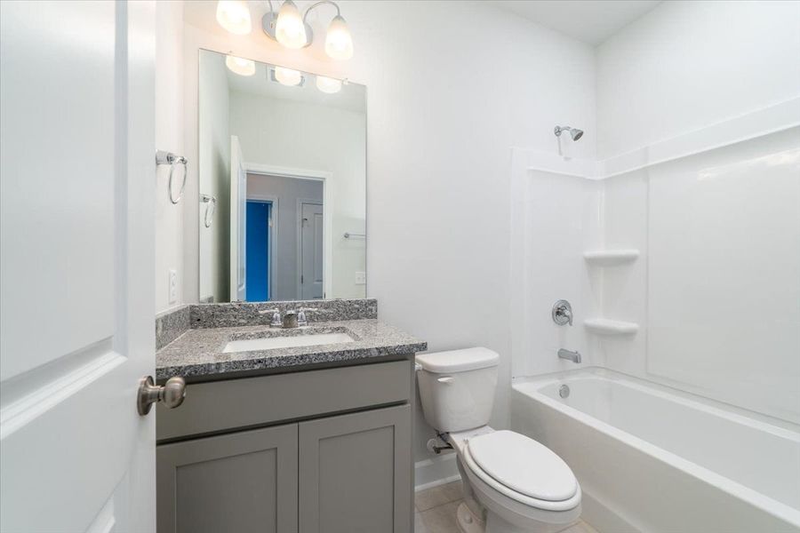 Guest Bathroom with shower and tub. Guest Bathroom with shower and tub.