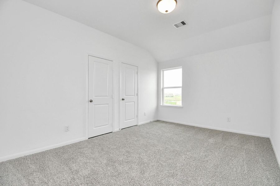 Spacious, unfurnished interior of a new home in Sunterra, Katy (Image 18).