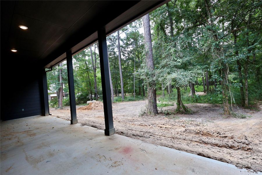 Exterior details and patio area of a home in , Magnolia (Image 1). Exterior details and patio area of a home in , Magnolia (Image 1).